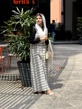 Yezwe modest dungaree dress in black and white plaid, perfect for stylish casual occasions